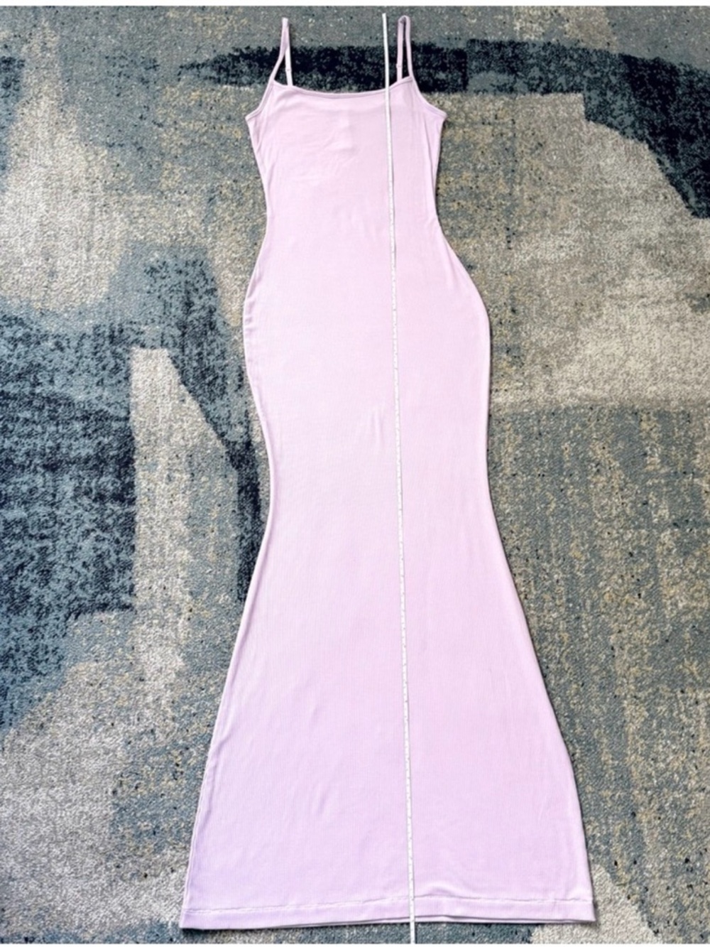 SKIMS Soft Lounge ribbed maxi dress in light pink with a slight lilac tone.
